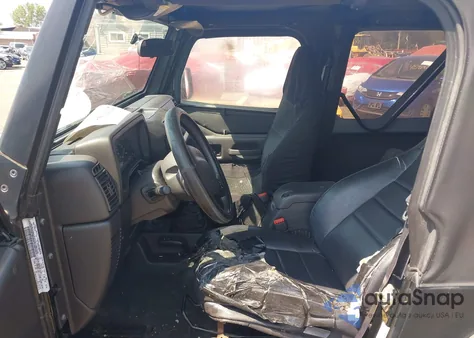 2001 Jeep Wrangler Se z USA, uszkodzony, nr VIN 1J4FA29P41P303563